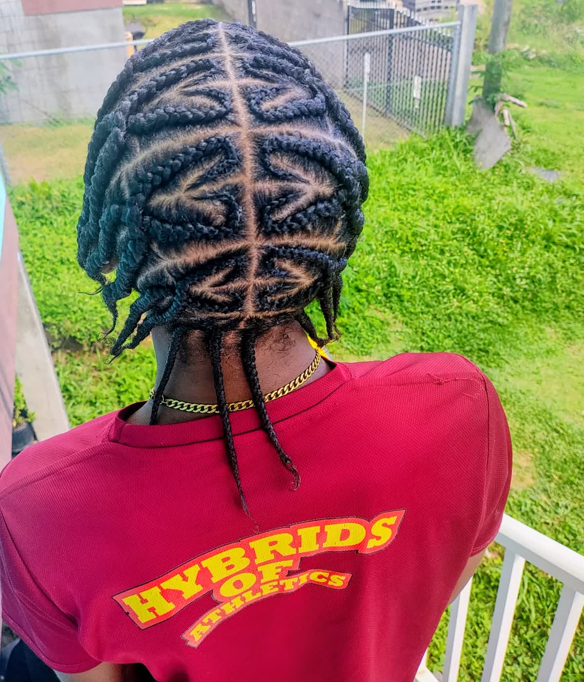 Geometric men’s parting braid style in Basseterre, St Kitts