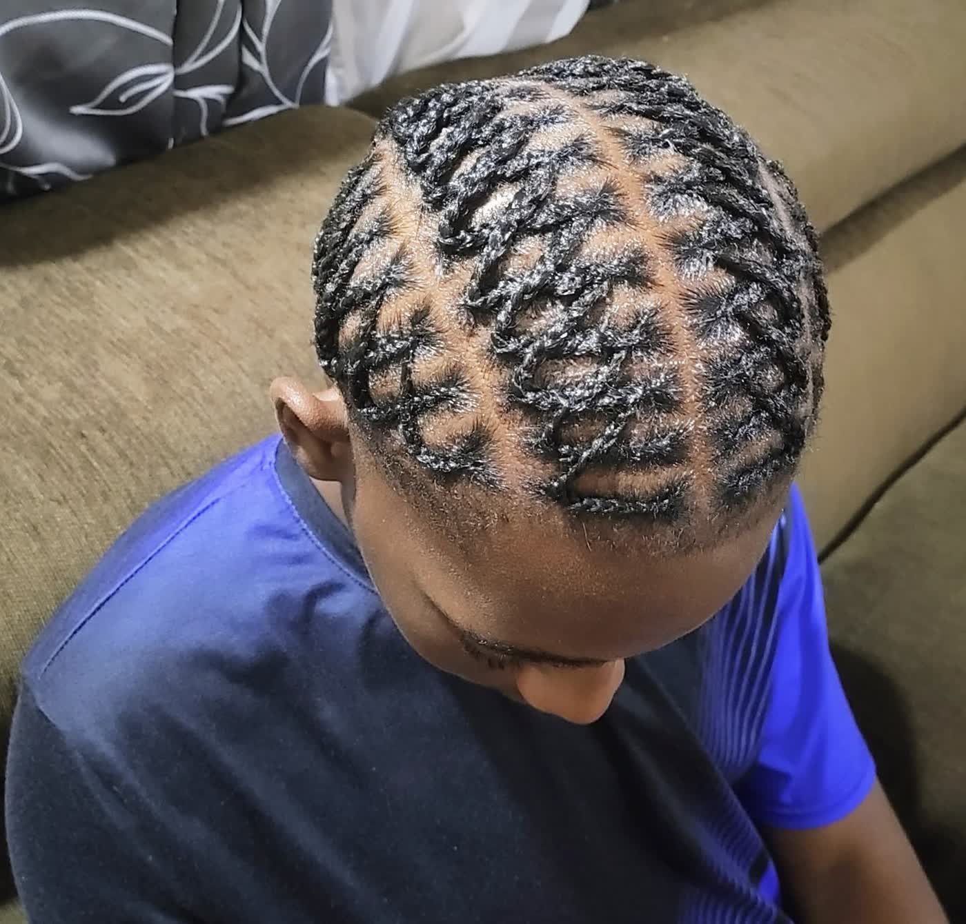 Medium-size men’s braid rows by Anointed Fingers in St Kitts