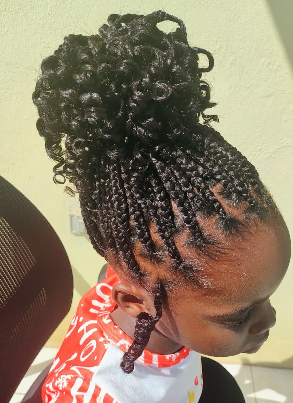 Neat kids braid finish by a family-friendly stylist in St Kitts